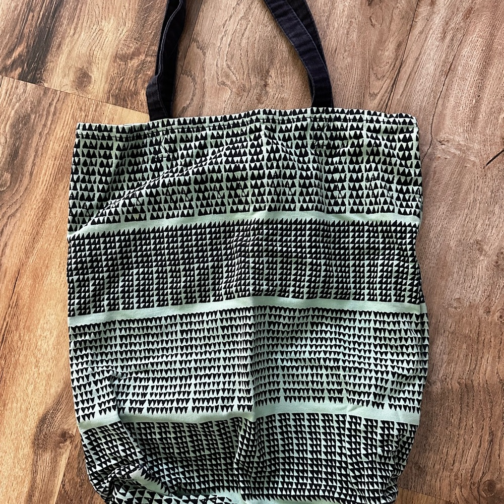 Manaola Black and Green Tote Bag with Striking Design